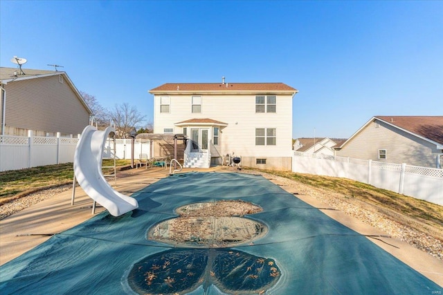 2537 Castle Pines Dr, Imperial, MO 63052 - rear view of property featuring a fenced backyard