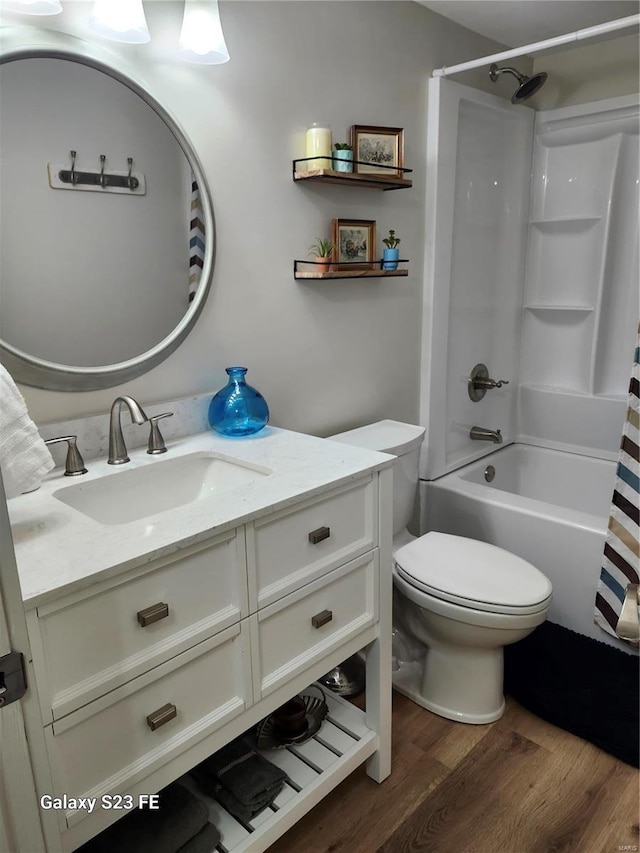972 Sunny Ridge Vw, Union, MO 63084 - bathroom with wood finished floors, vanity, toilet, and shower / bath combination with curtain