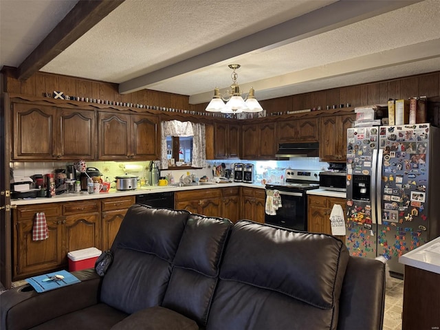 22755 Pin Oak Dr, Lebanon, MO 65536 - kitchen featuring appliances with stainless steel finishes, under cabinet range hood, open floor plan, beam ceiling, and a sink