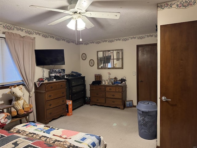 22755 Pin Oak Dr, Lebanon, MO 65536 - bedroom with light colored carpet, a ceiling fan, and a textured ceiling