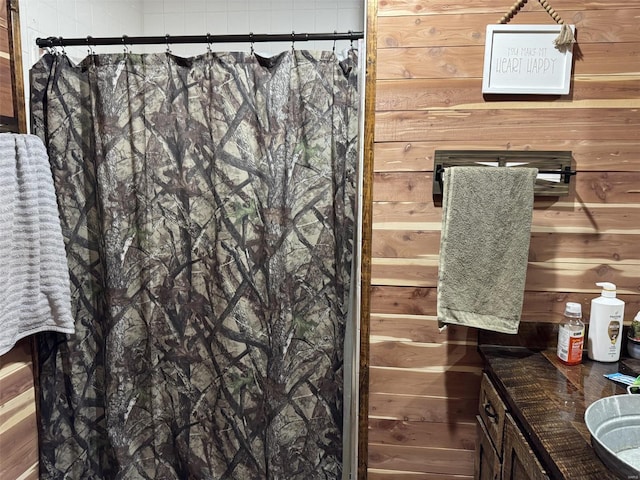 22755 Pin Oak Dr, Lebanon, MO 65536 - full bath with wooden walls, curtained shower, and vanity