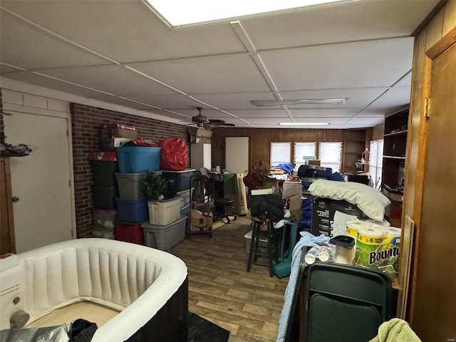 22755 Pin Oak Dr, Lebanon, MO 65536 - basement with wood finished floors, wooden walls, and ceiling fan