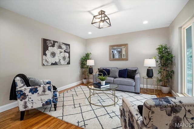 4501 Conleth Dr, Saint Louis, MO 63129 - living area featuring baseboards, wood finished floors, and recessed lighting