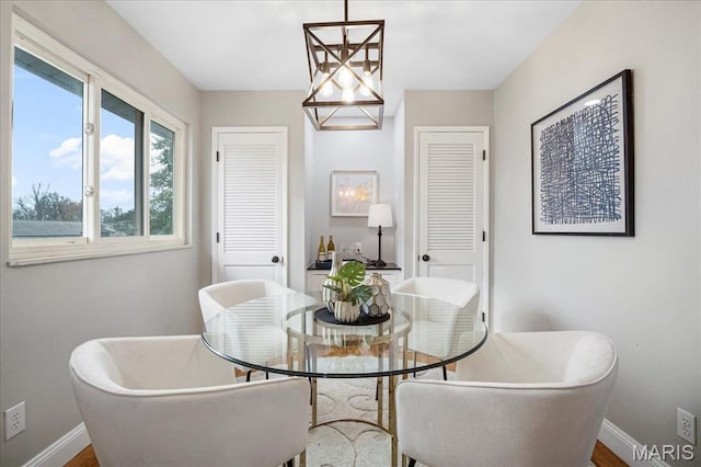 4501 Conleth Dr, Saint Louis, MO 63129 - dining area featuring baseboards and wood finished floors