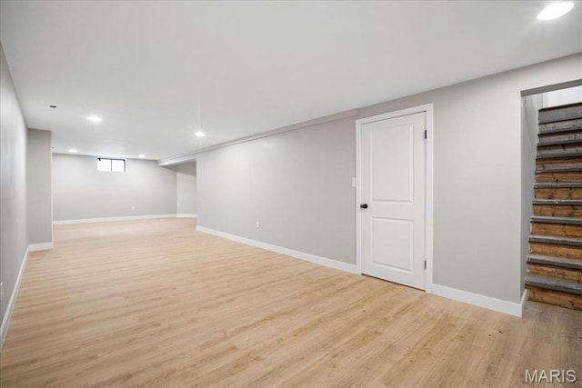 4501 Conleth Dr, Saint Louis, MO 63129 - basement with recessed lighting, light wood-style flooring, baseboards, and stairs