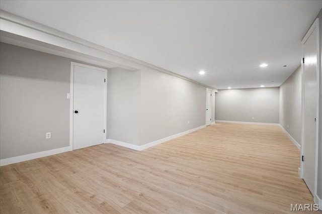 4501 Conleth Dr, Saint Louis, MO 63129 - finished basement with light wood-style floors, recessed lighting, and baseboards