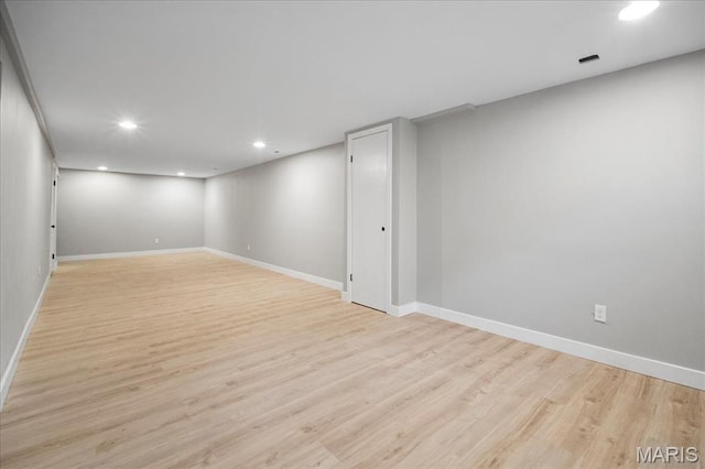 4501 Conleth Dr, Saint Louis, MO 63129 - finished basement featuring light wood-style floors, baseboards, and recessed lighting
