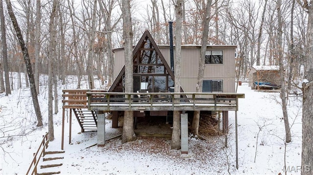 353 Seebrook Lake Dr, Wright City, MO 63390 - snow covered back of property with stairway and a wooden deck