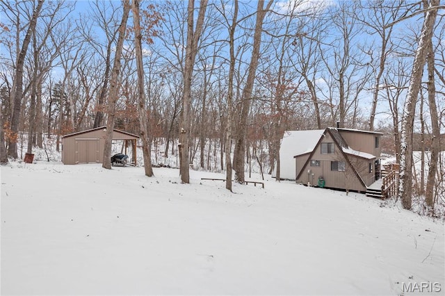 353 Seebrook Lake Dr, Wright City, MO 63390 - yard covered in snow featuring an outbuilding