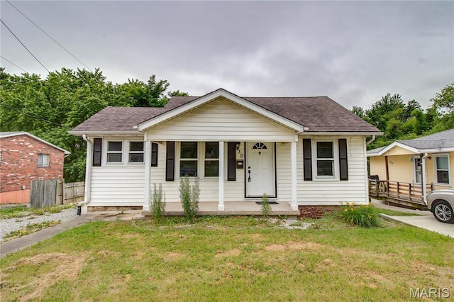 330 Grant St, Bethalto, IL 62010 - view of front of property with a porch and roof with shingles