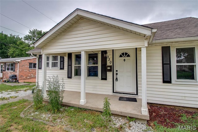 330 Grant St, Bethalto, IL 62010 - view of front facade with a porch and roof with shingles