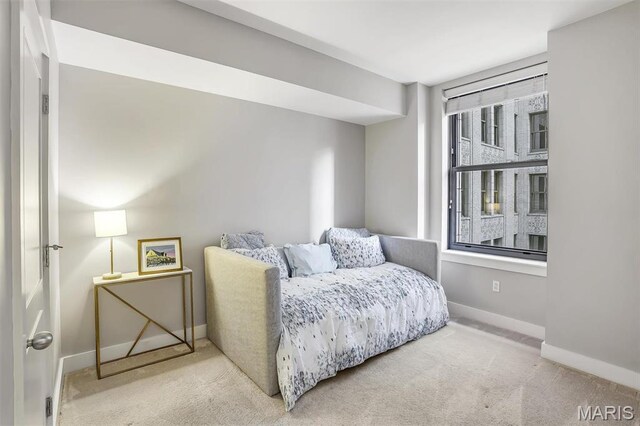 314 N Broadway Unit 903, Saint Louis, MO 63102 - carpeted bedroom featuring baseboards