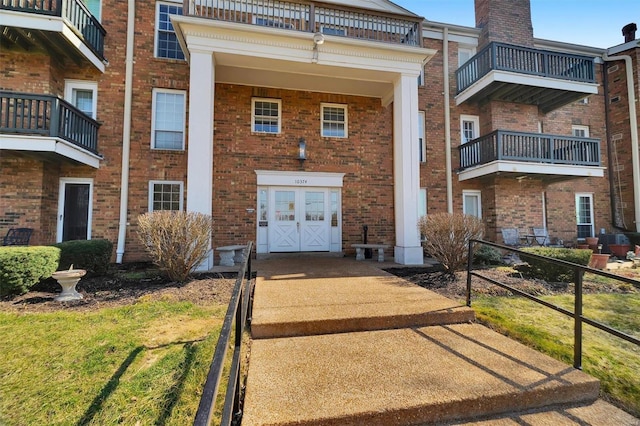 10374 Chimney Rock Dr Unit 22, Creve Coeur, MO 63146 - property entrance with brick siding
