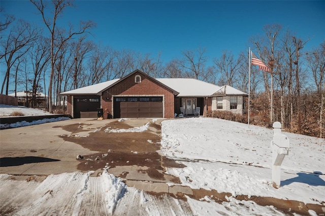450 Worth St, Holts Summit, MO 65043 - single story home with an attached garage, brick siding, and driveway