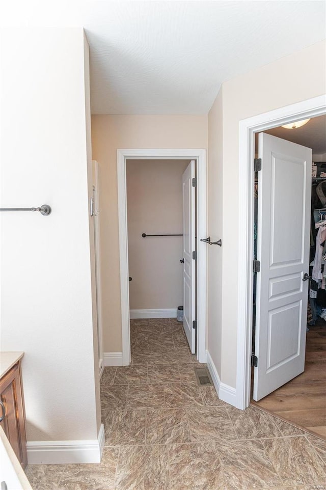 450 Worth St, Holts Summit, MO 65043 - bathroom with a spacious closet and baseboards