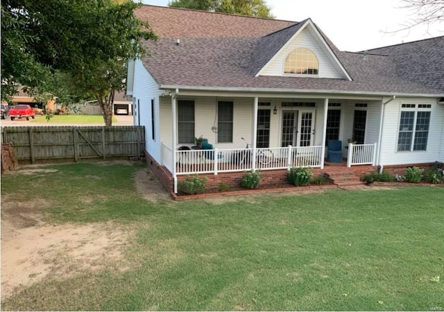 902 S Sutton Pl, Kennett, MO 63857 - view of front of home featuring covered porch and a shingled roof