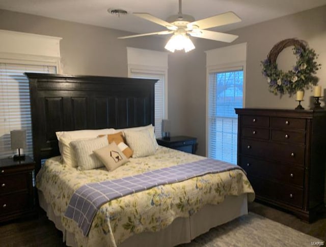 902 S Sutton Pl, Kennett, MO 63857 - bedroom with wood finished floors and ceiling fan