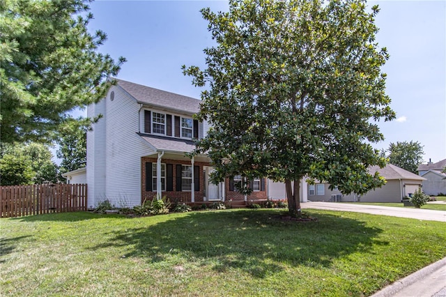 view of front of property with brick siding and driveway