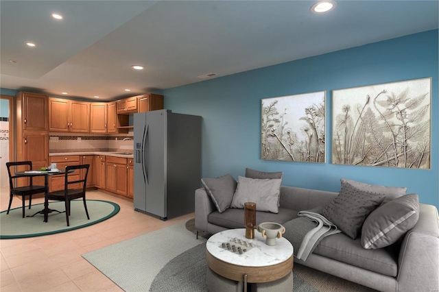 living area featuring recessed lighting