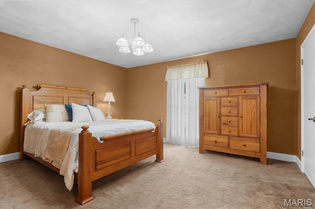 800 N Smiley St, Ofallon, IL 62269 - bedroom with light colored carpet, a chandelier, and baseboards