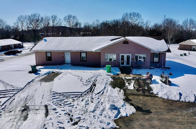 453 Cedar St, Bismarck, MO 63624 - snow covered back of property with french doors