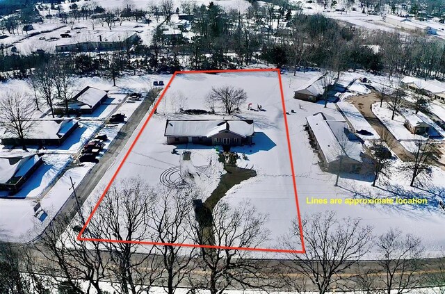 453 Cedar St, Bismarck, MO 63624 - snowy aerial view featuring property boundaries highlighted