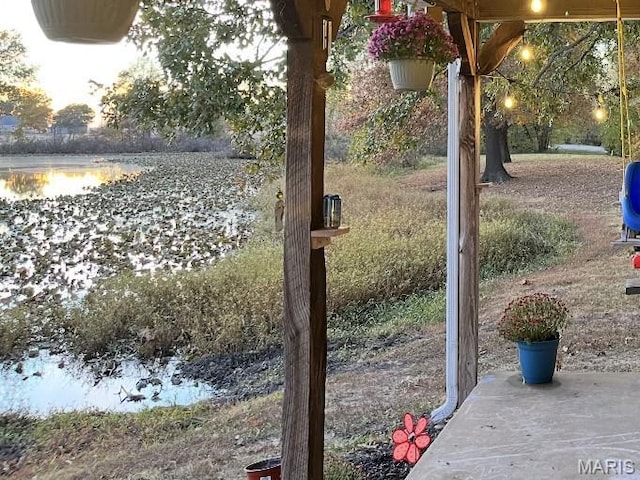 view of patio / terrace featuring a water view