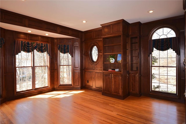 821 Oak Knoll Rd, Rolla, MO 65401 - foyer with light wood-style flooring, recessed lighting, ornamental molding, and wooden walls