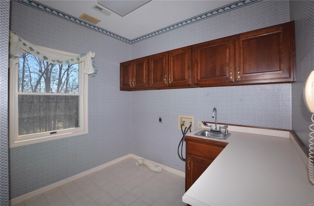 821 Oak Knoll Rd, Rolla, MO 65401 - laundry area with hookup for a washing machine, cabinet space, hookup for an electric dryer, wet bar, and baseboards