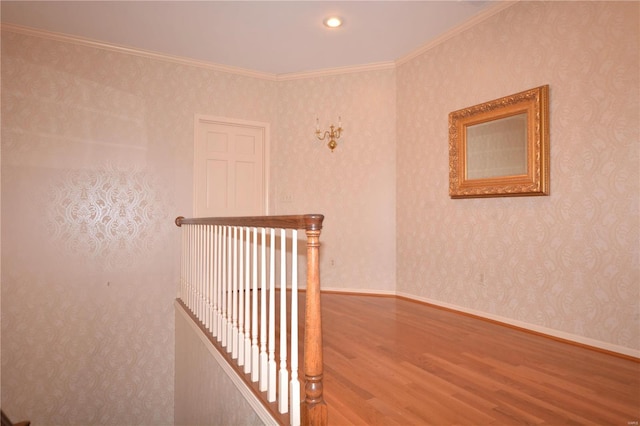 821 Oak Knoll Rd, Rolla, MO 65401 - hallway with wood finished floors and crown molding