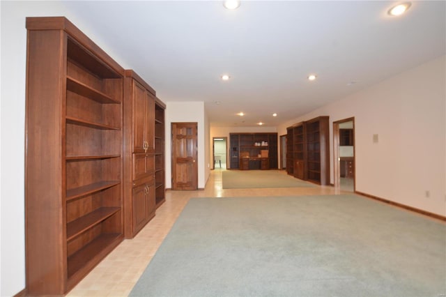 821 Oak Knoll Rd, Rolla, MO 65401 - unfurnished living room featuring recessed lighting and baseboards