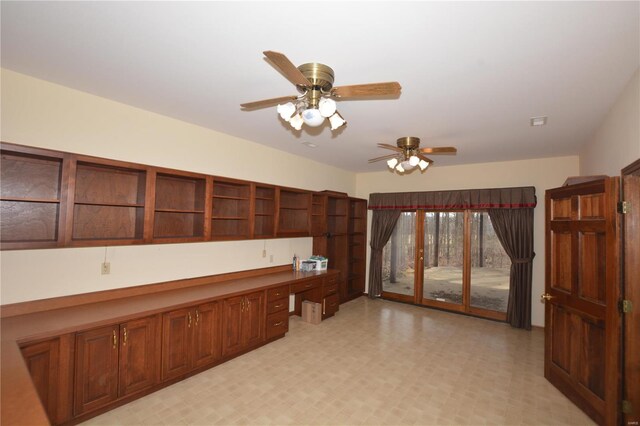 821 Oak Knoll Rd, Rolla, MO 65401 - kitchen featuring open shelves, a ceiling fan, and light floors