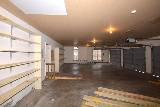 821 Oak Knoll Rd, Rolla, MO 65401 - garage featuring a garage door opener
