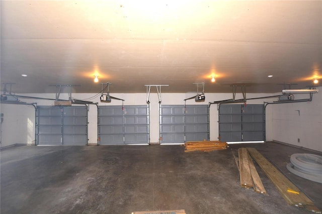 821 Oak Knoll Rd, Rolla, MO 65401 - garage featuring a garage door opener
