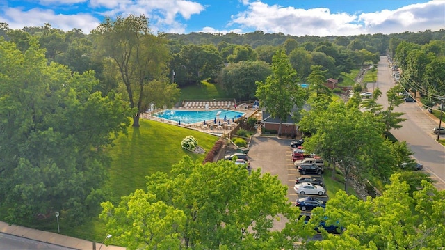 1418 Bluebird Ter, Saint Louis, MO 63144 - view of property location featuring a pool and a forest