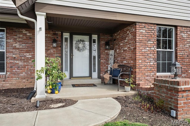 1578 Mason Knoll Rd, Town And Country, MO 63131 - property entrance featuring brick siding and a porch