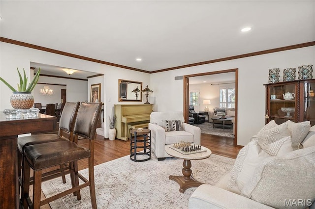 1578 Mason Knoll Rd, Town And Country, MO 63131 - living room with wood finished floors, a chandelier, recessed lighting, and crown molding