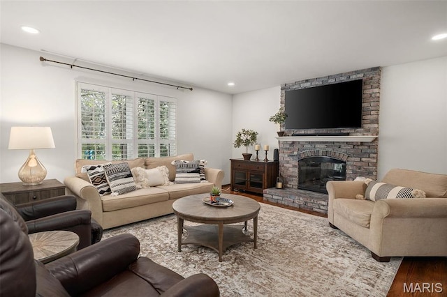 1578 Mason Knoll Rd, Town And Country, MO 63131 - living room featuring wood finished floors, a brick fireplace, and recessed lighting