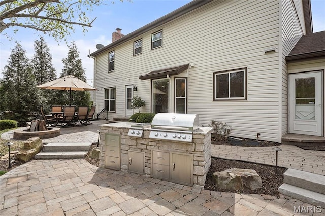 1578 Mason Knoll Rd, Town And Country, MO 63131 - view of patio / terrace featuring outdoor dining area