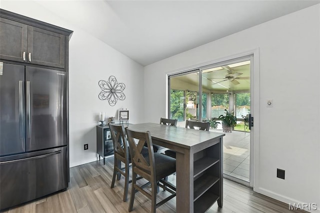 429 Arbor Meadow Ct, Ballwin, MO 63021 - dining space featuring wood finished floors, baseboards, and a ceiling fan