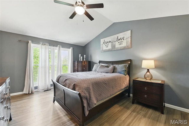 429 Arbor Meadow Ct, Ballwin, MO 63021 - bedroom featuring baseboards, lofted ceiling, wood finished floors, and ceiling fan