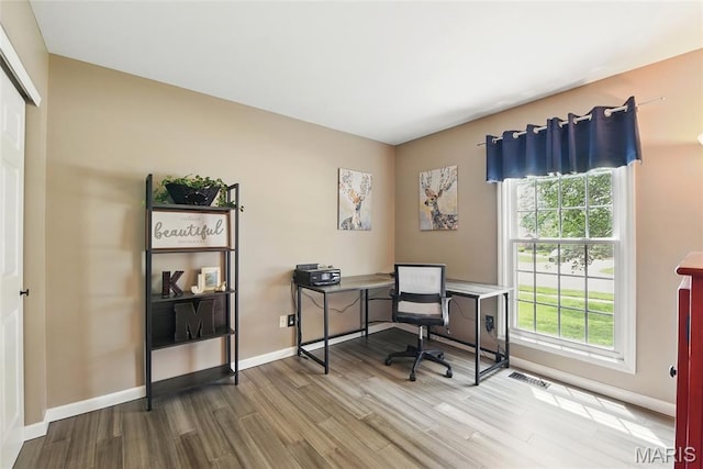 429 Arbor Meadow Ct, Ballwin, MO 63021 - office space with wood finished floors, plenty of natural light, and baseboards