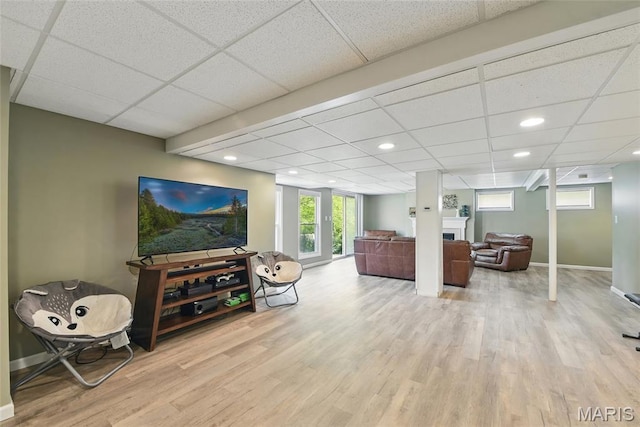 429 Arbor Meadow Ct, Ballwin, MO 63021 - living room with a fireplace, a drop ceiling, wood finished floors, baseboards, and recessed lighting