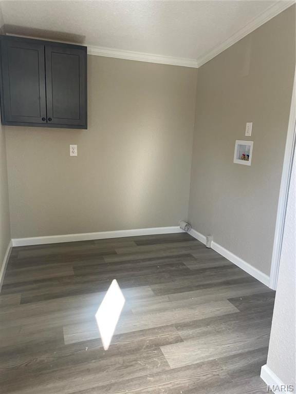 61 Wildwood Ter, Sullivan, MO 63080 - laundry room featuring washer hookup, wood finished floors, crown molding, baseboards, and cabinet space