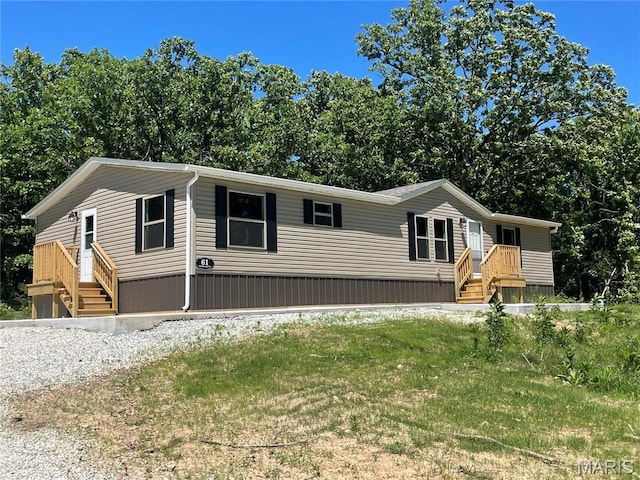61 Wildwood Ter, Sullivan, MO 63080 - manufactured / mobile home featuring view of wooded area