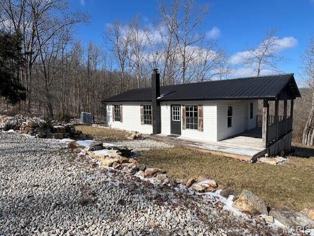 11498 M-Weatherman Dr, Mountain Grove, MO 65711 - rear view of property featuring a chimney