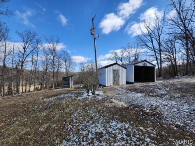 11498 M-Weatherman Dr, Mountain Grove, MO 65711 - view of yard with an outbuilding and a garage