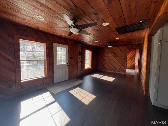 11498 M-Weatherman Dr, Mountain Grove, MO 65711 - foyer featuring wood ceiling, wood walls, ceiling fan, and dark wood finished floors