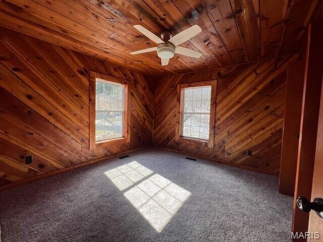 11498 M-Weatherman Dr, Mountain Grove, MO 65711 - empty room with wooden ceiling, a ceiling fan, carpet floors, and wood walls