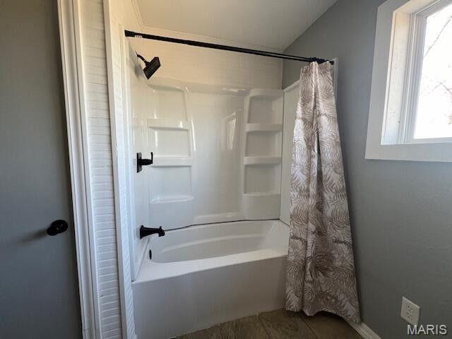 11498 M-Weatherman Dr, Mountain Grove, MO 65711 - bathroom featuring healthy amount of natural light, shower / bath combo with shower curtain, and tile patterned flooring